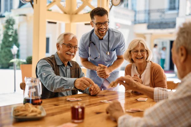 Caregiver engaging with senior resident